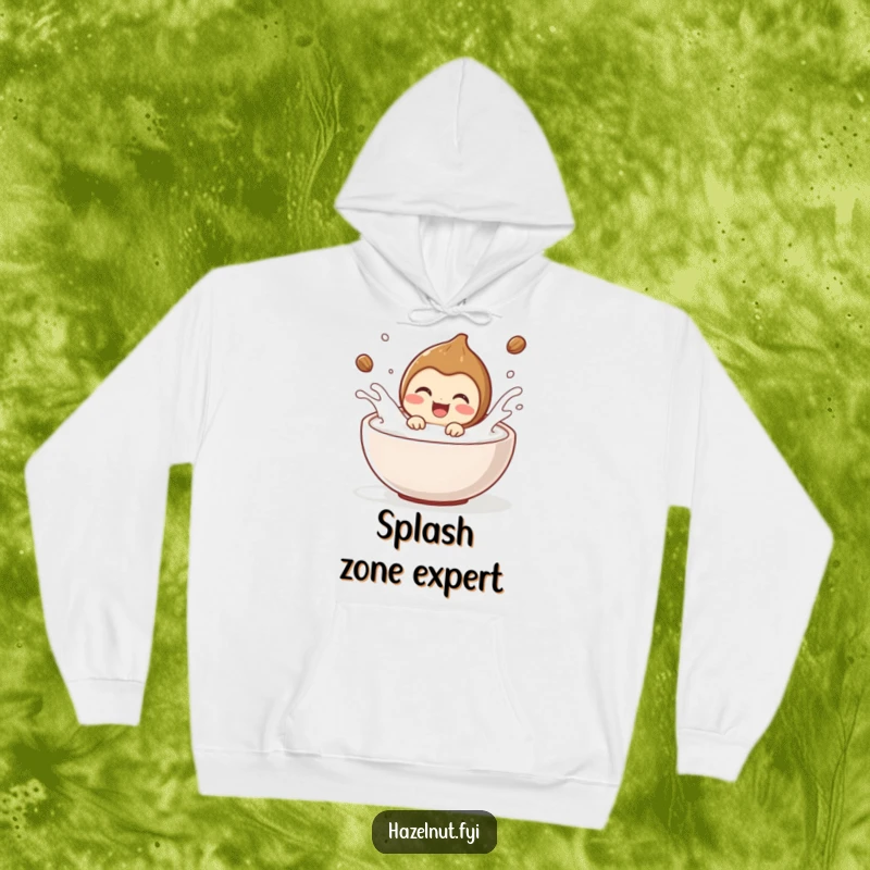 Funny hazelnut character delighted, splashing joyfully in milk, featured on a cozy hoodie. Great funny gift.