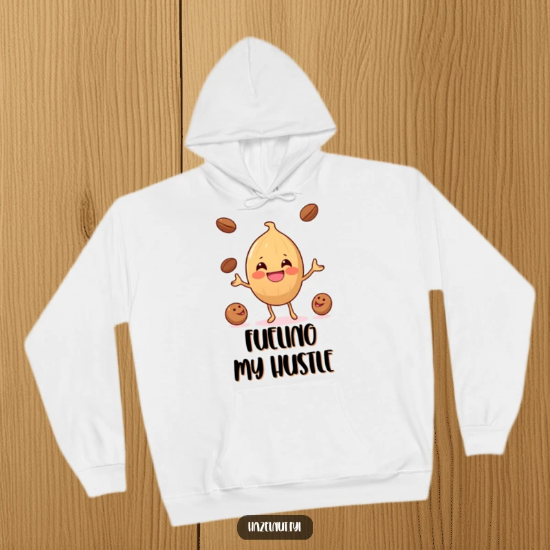 Funny Hazelnut Coffee Bean Juggler Hoodie: A happy hazelnut juggles coffee beans, depicted on a comfy hoodie for maximum amusement.