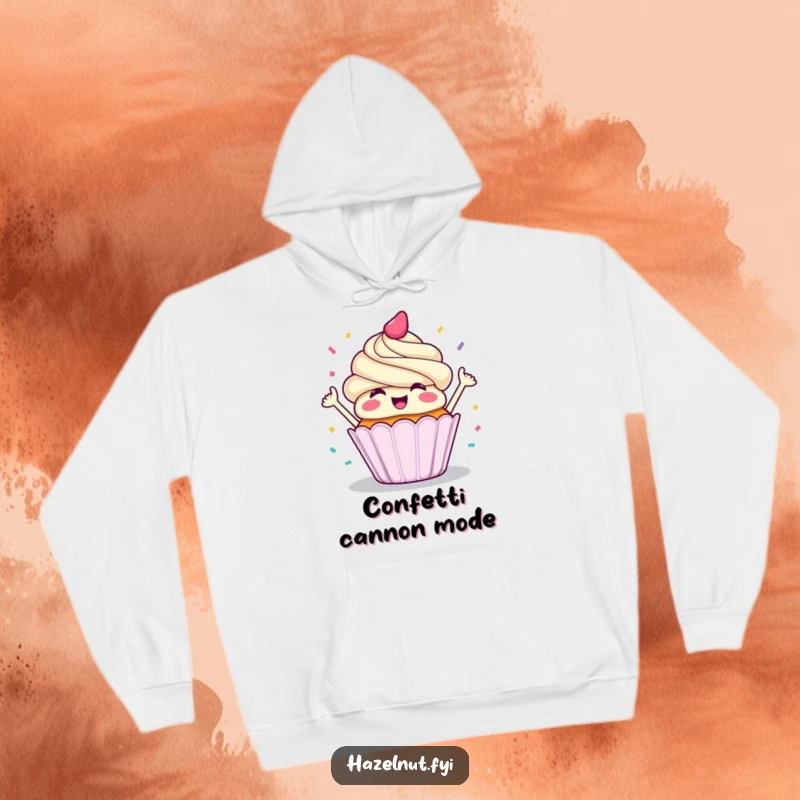 Funny hoodie with a delighted cupcake throwing a cascade of confetti, designed for warm, celebratory comfort.
