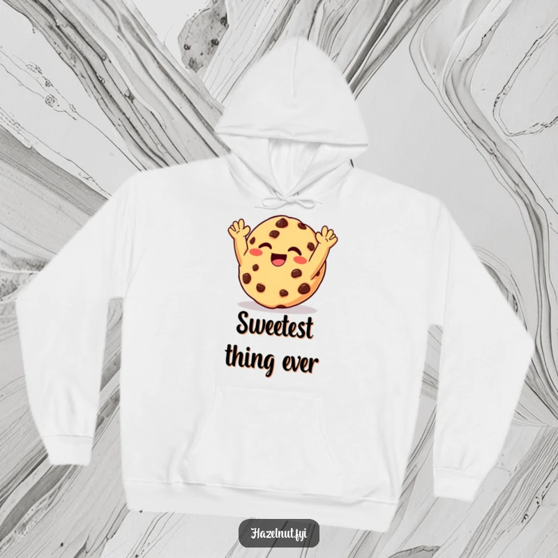 Funny hoodie featuring a giggling chocolate chip cookie with arms raised in delight, offering warmth and sweet joy.