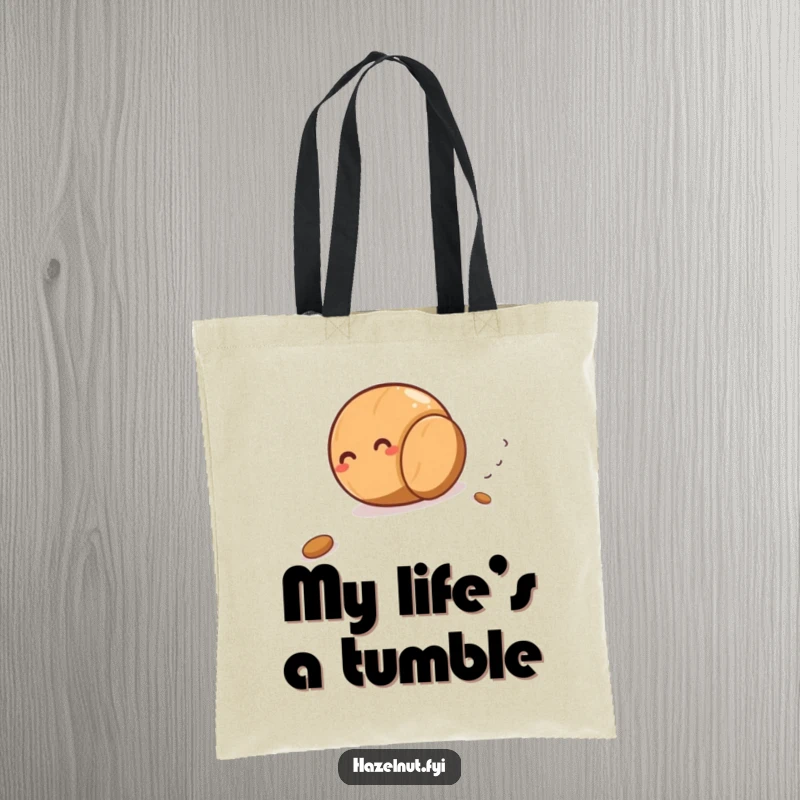 Funny hazelnut giggling as it rolls downhill on a durable tote bag, perfect for carrying essentials with nutty humor.